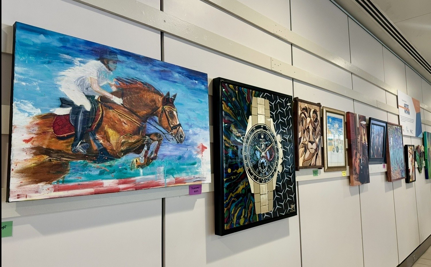 PODEROSO at the Orlando International Airport exhibit wall