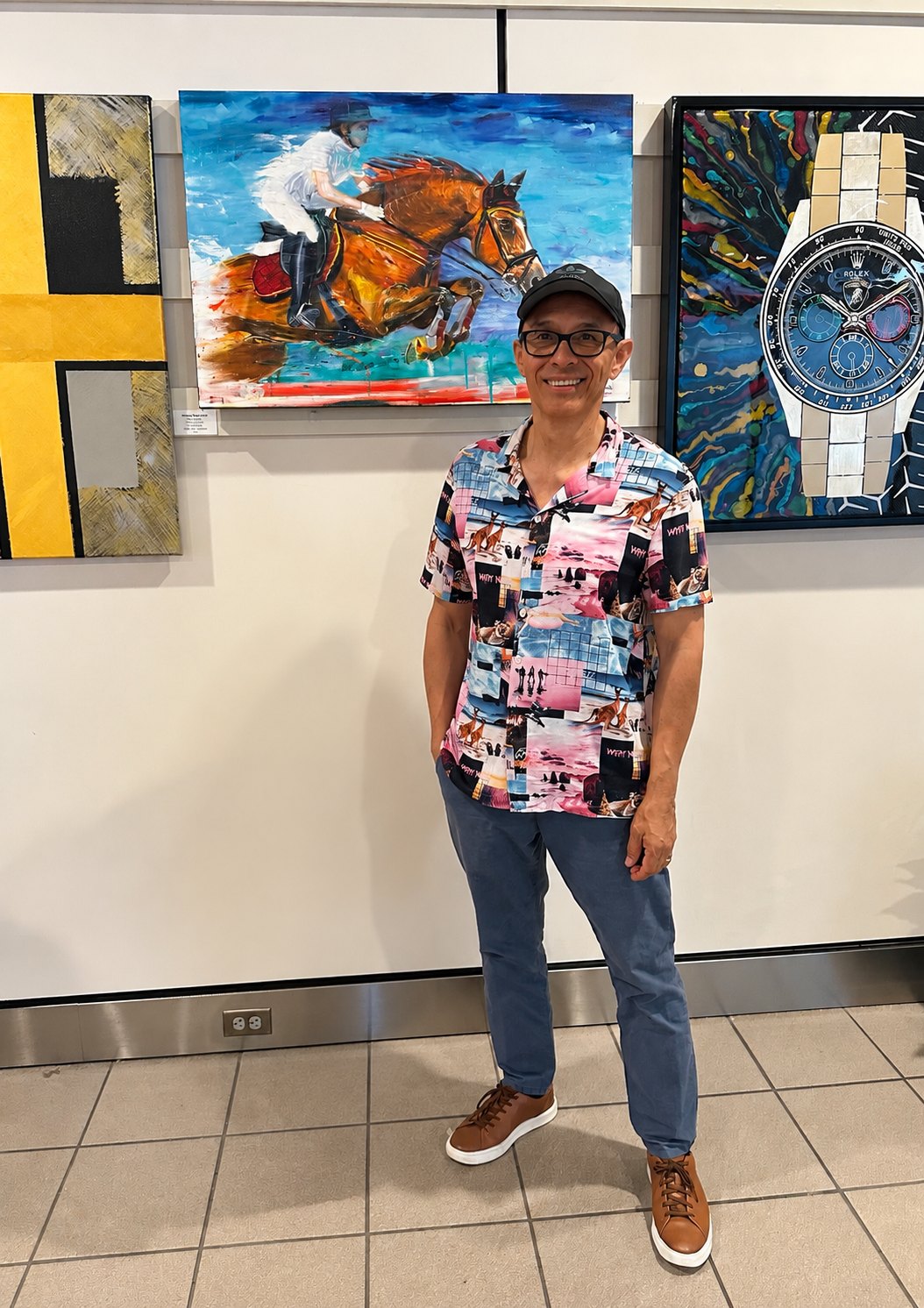 Roberto Leon beside PODEROSO at the MCO exhibit